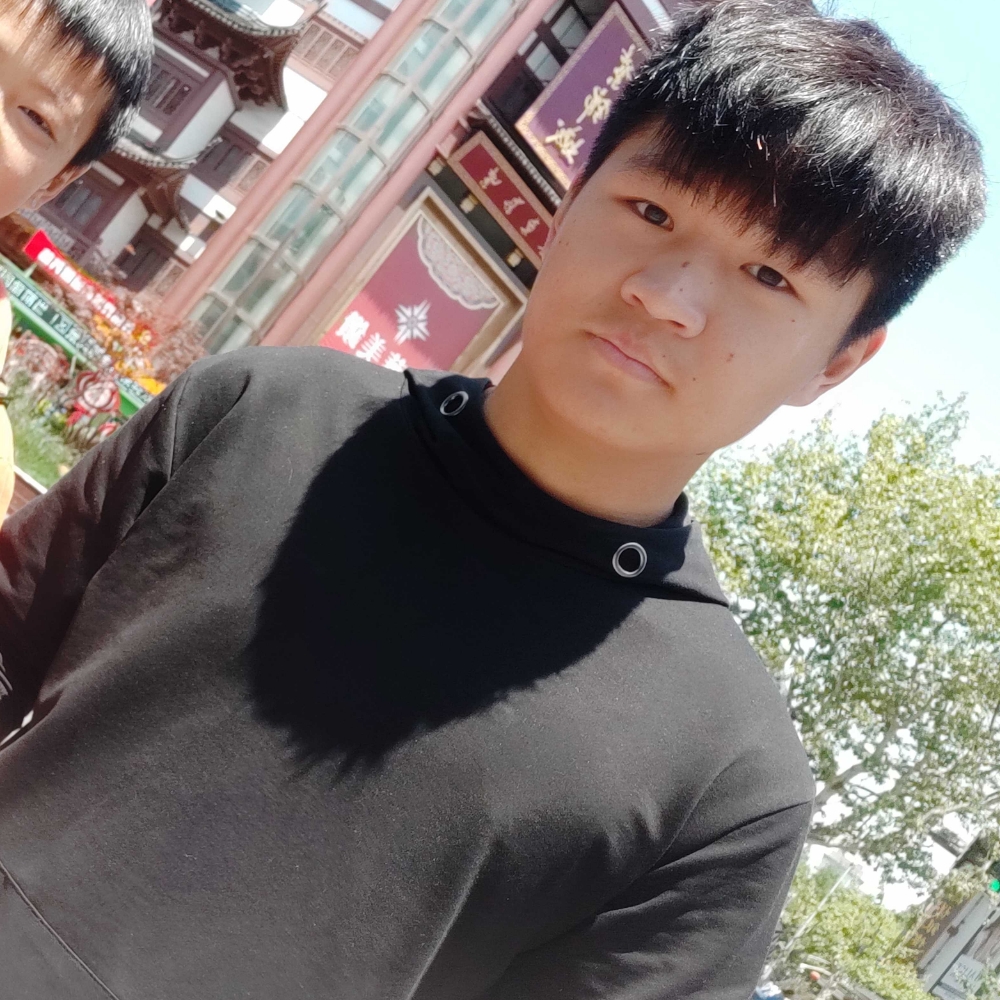 懵懂拿芒果的照片