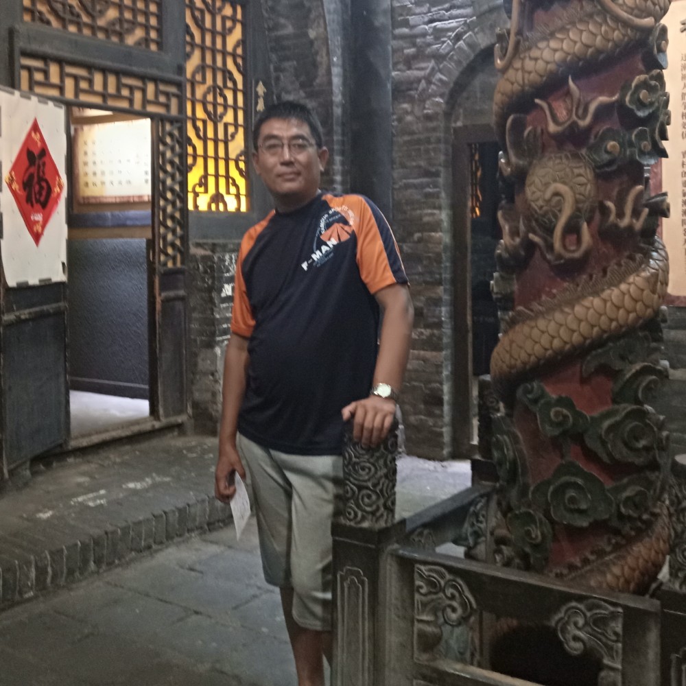 麻将弥勒佛的照片