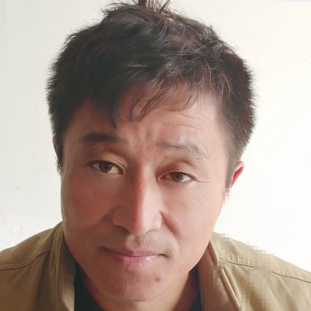 野狼拿落拓的照片