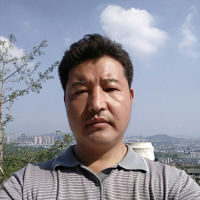 鲁国布衣的照片
