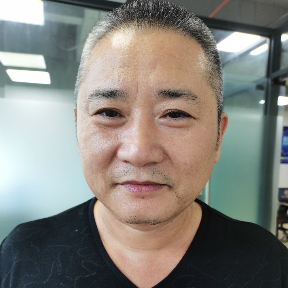 老牛推小车的照片