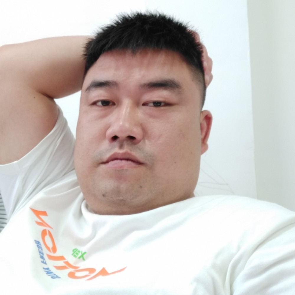 粑粑村老帅哥的照片