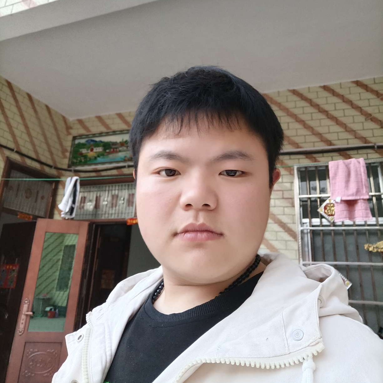 精明打外套的照片