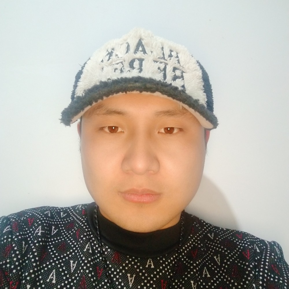 昕，默默的照片