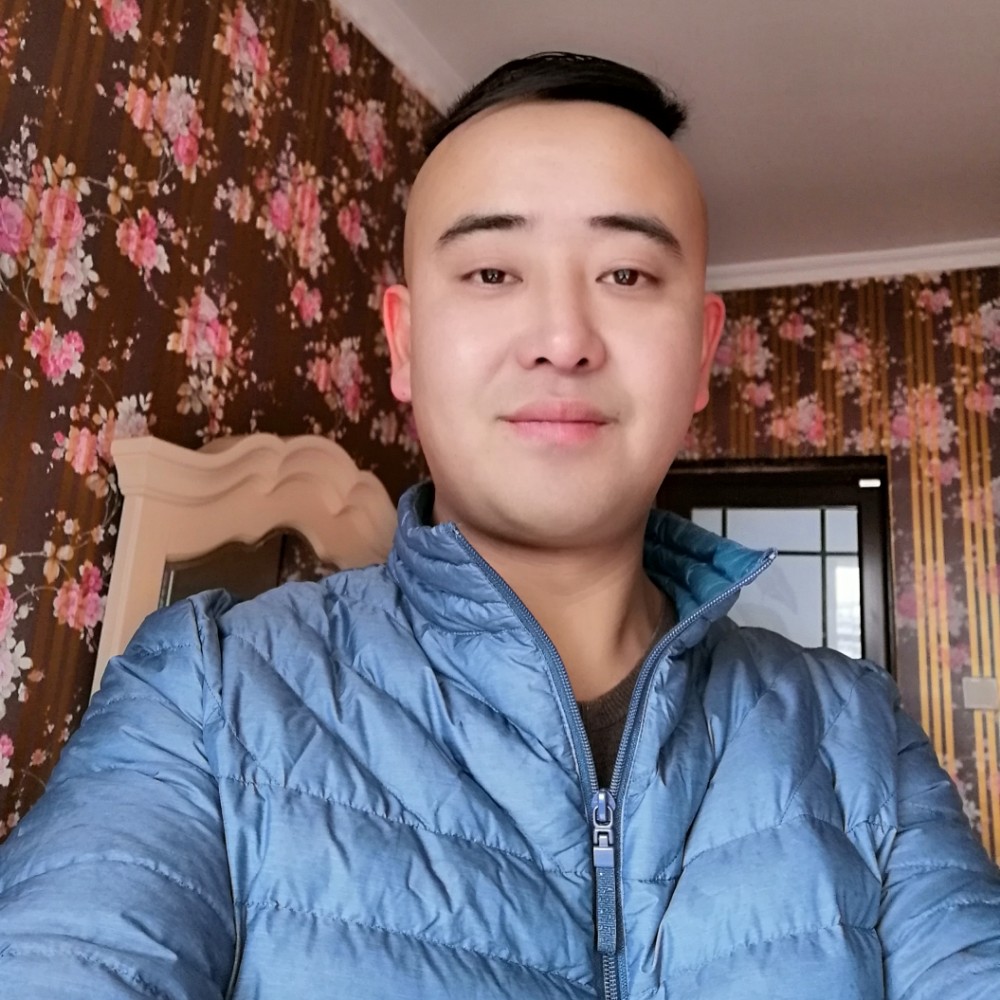 丁  丁的照片