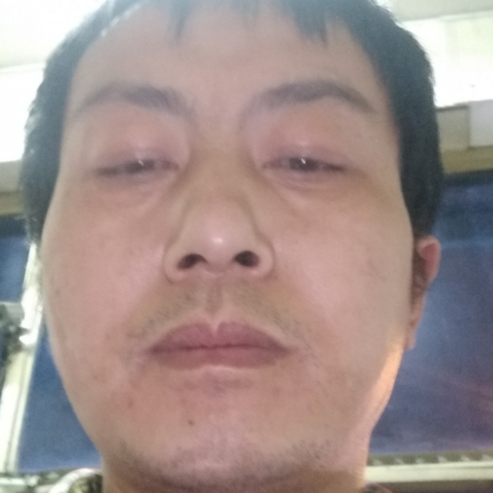 丁成义的照片