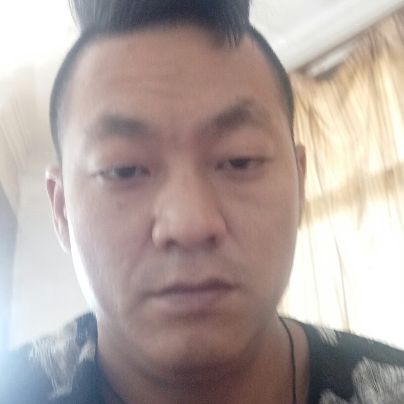 周明荣的照片