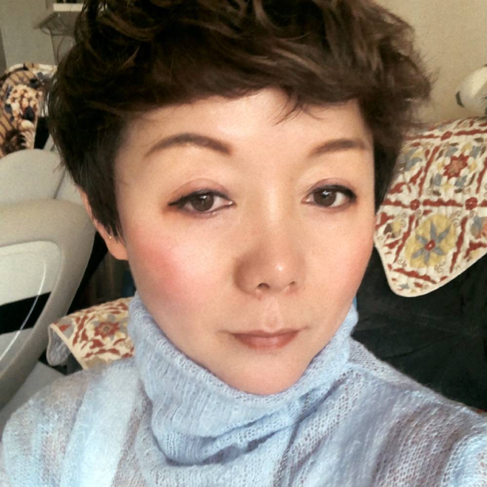 水杯向妖娆的照片