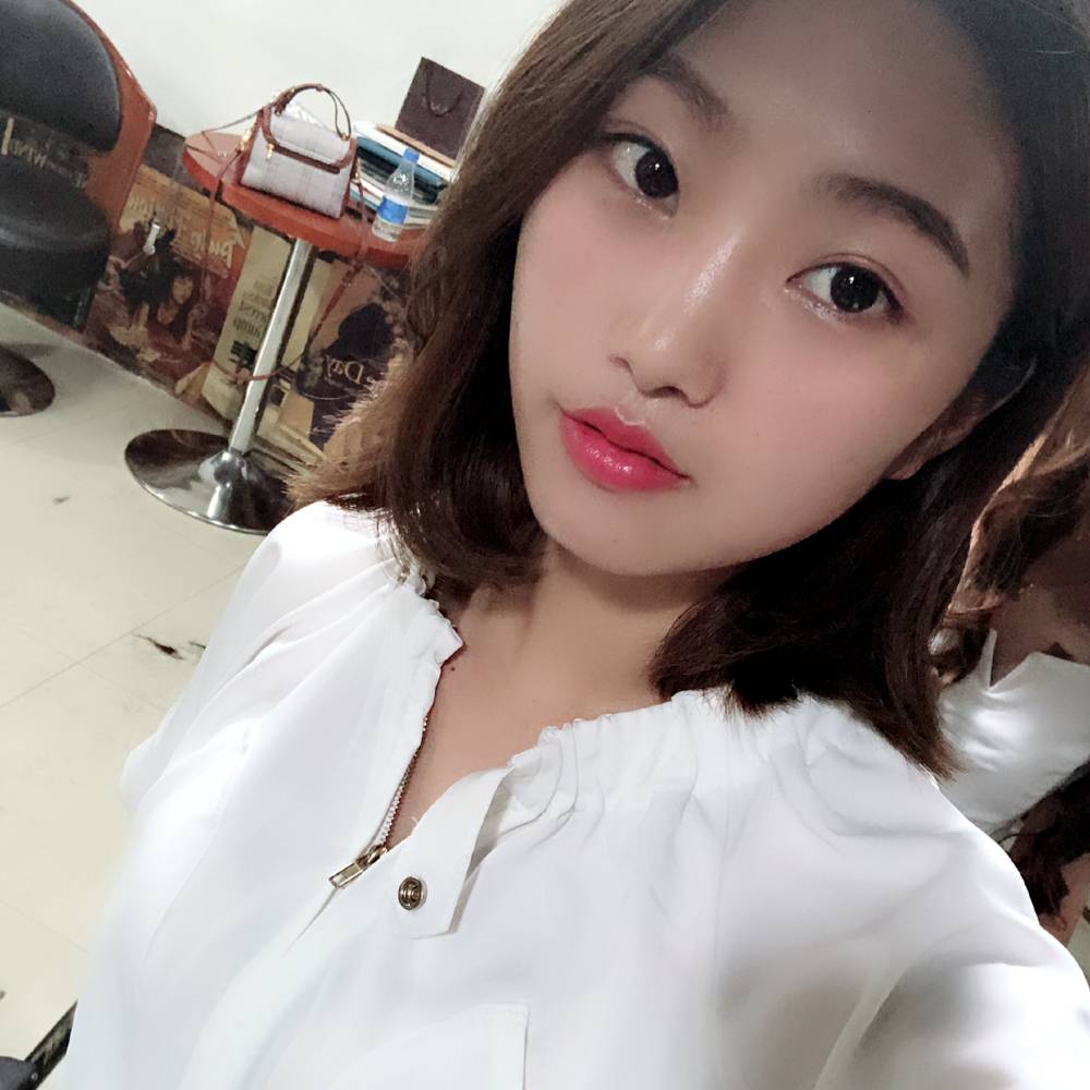 可爱的傻妞的照片