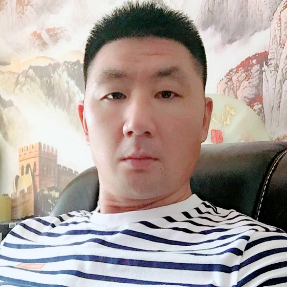 温暖拿沐樱的照片