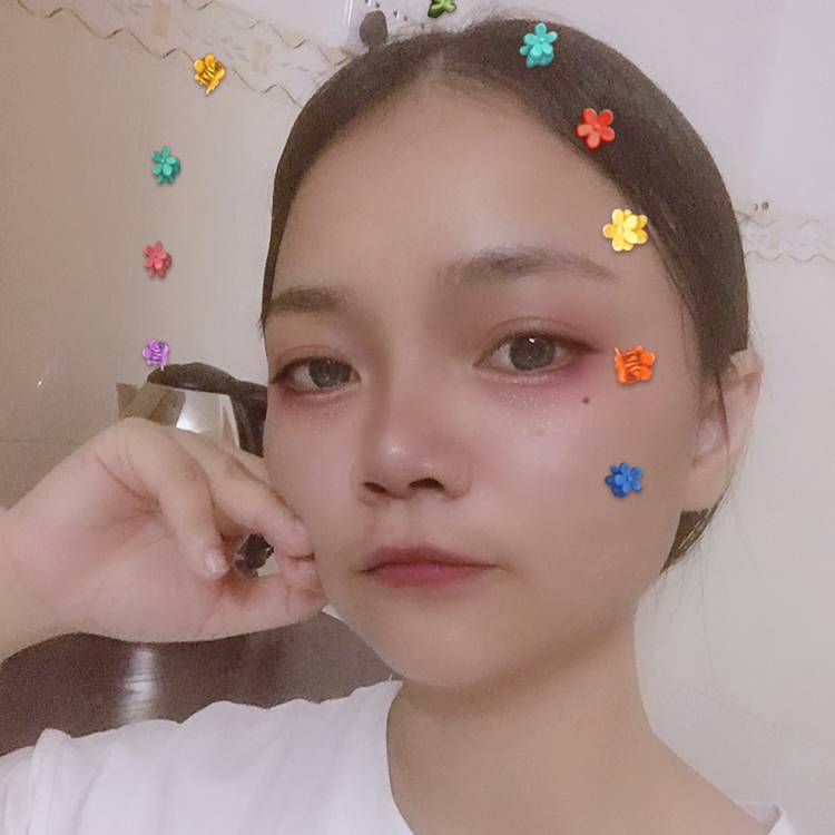 明理回眸小蝴蝶的照片