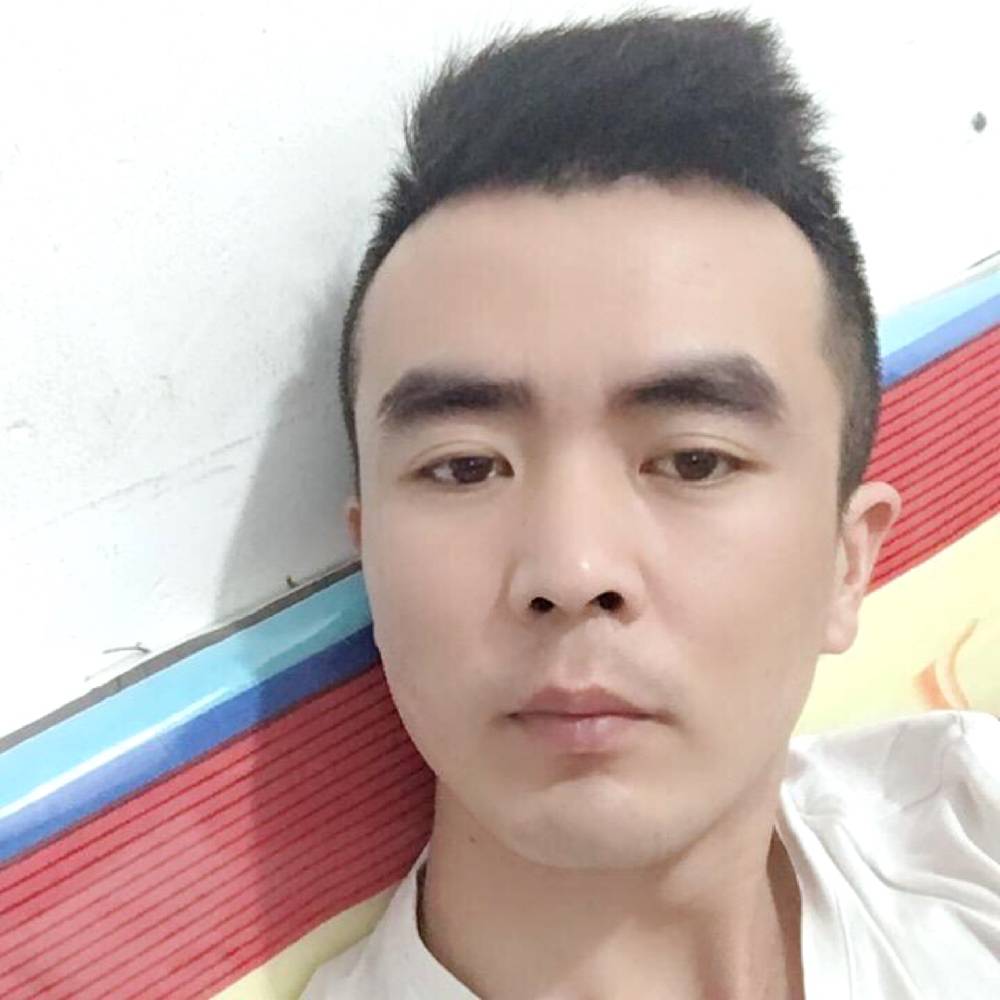 微笑苦恋母鸡的照片