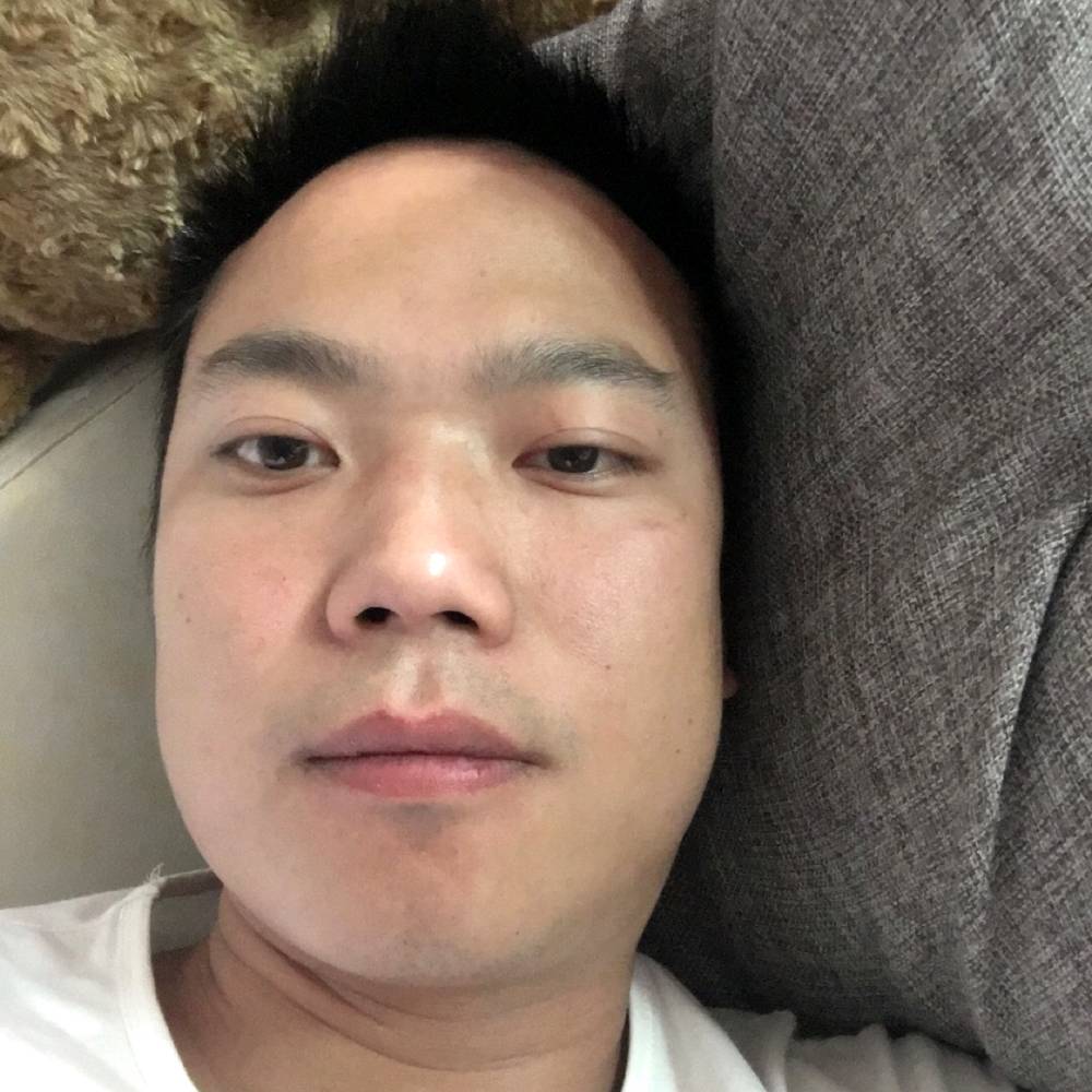 坚强扯棒棒糖的照片