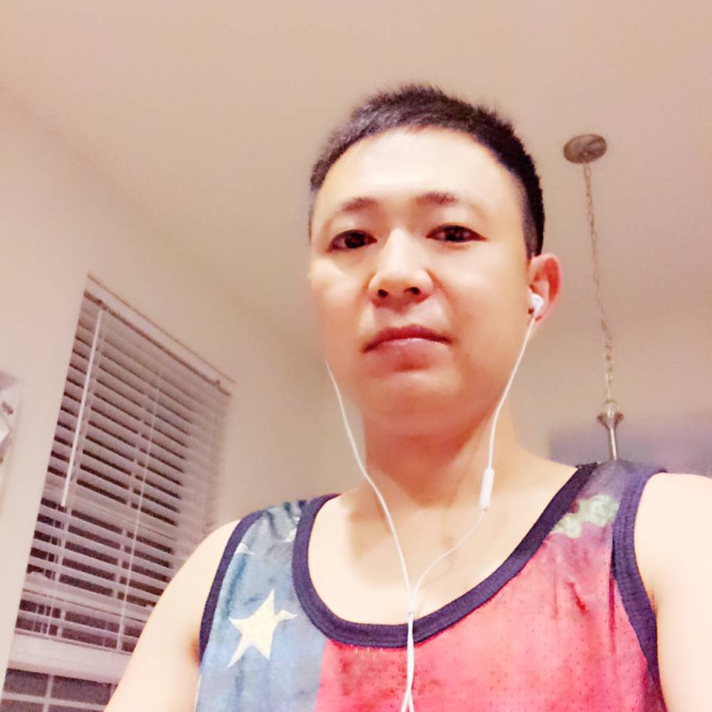 Huang广泛的照片