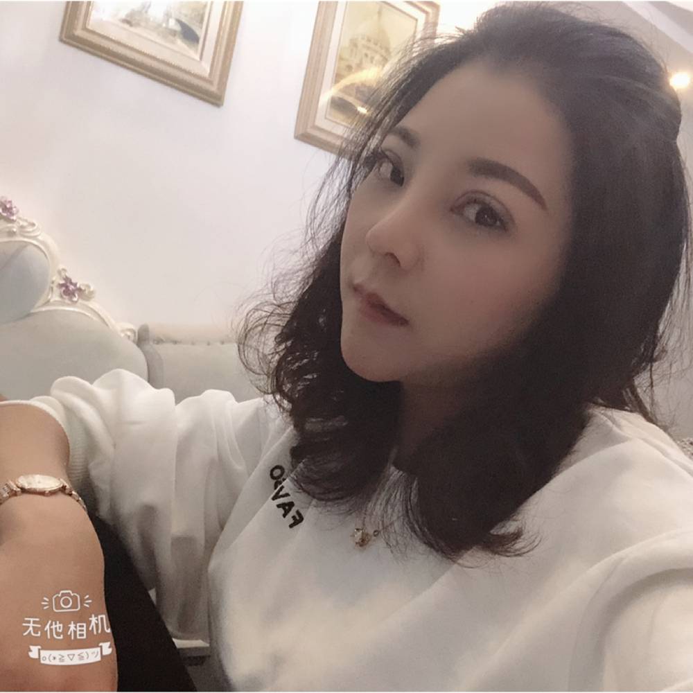 伍媚的照片