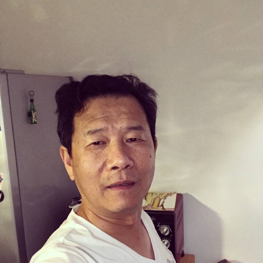 温暖挽手风萧的照片
