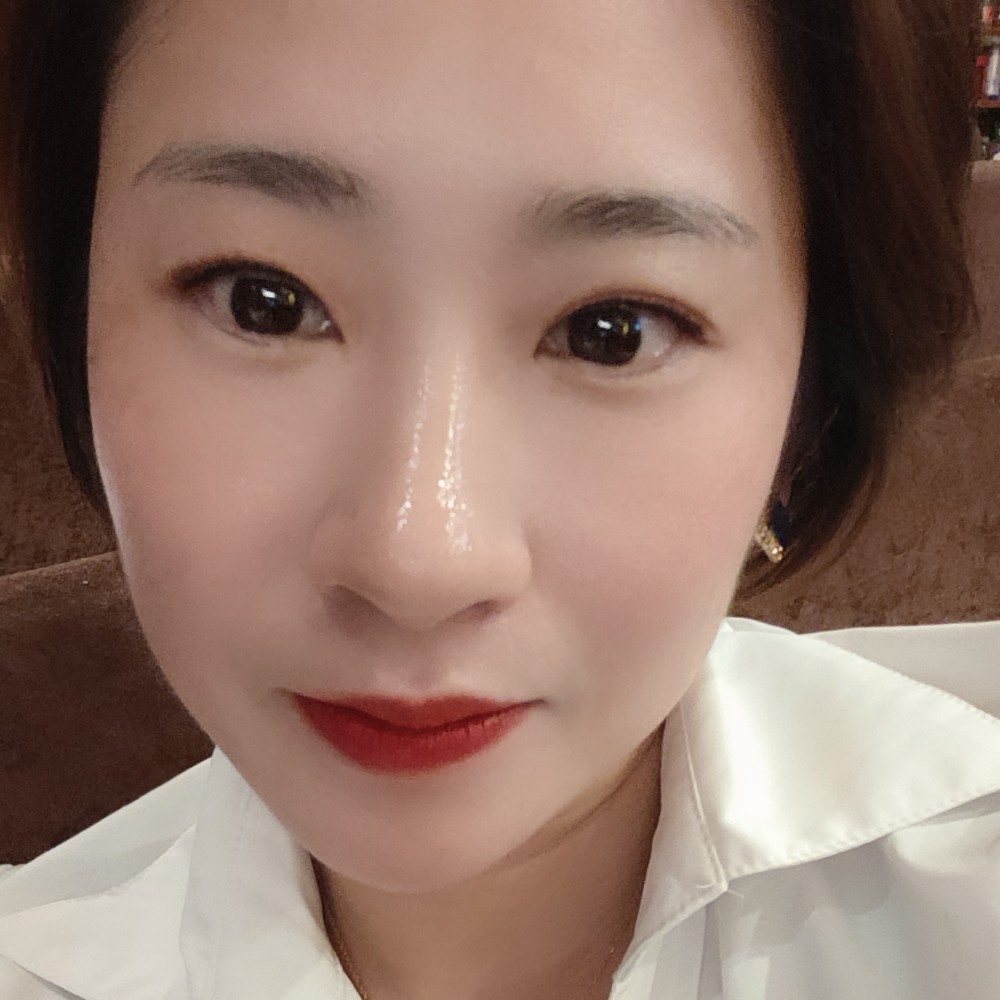 明媚就泪雨的照片