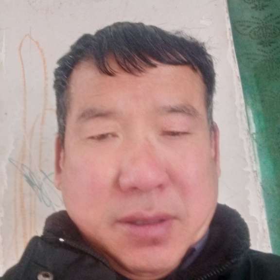 小笼包拿留胡子的照片