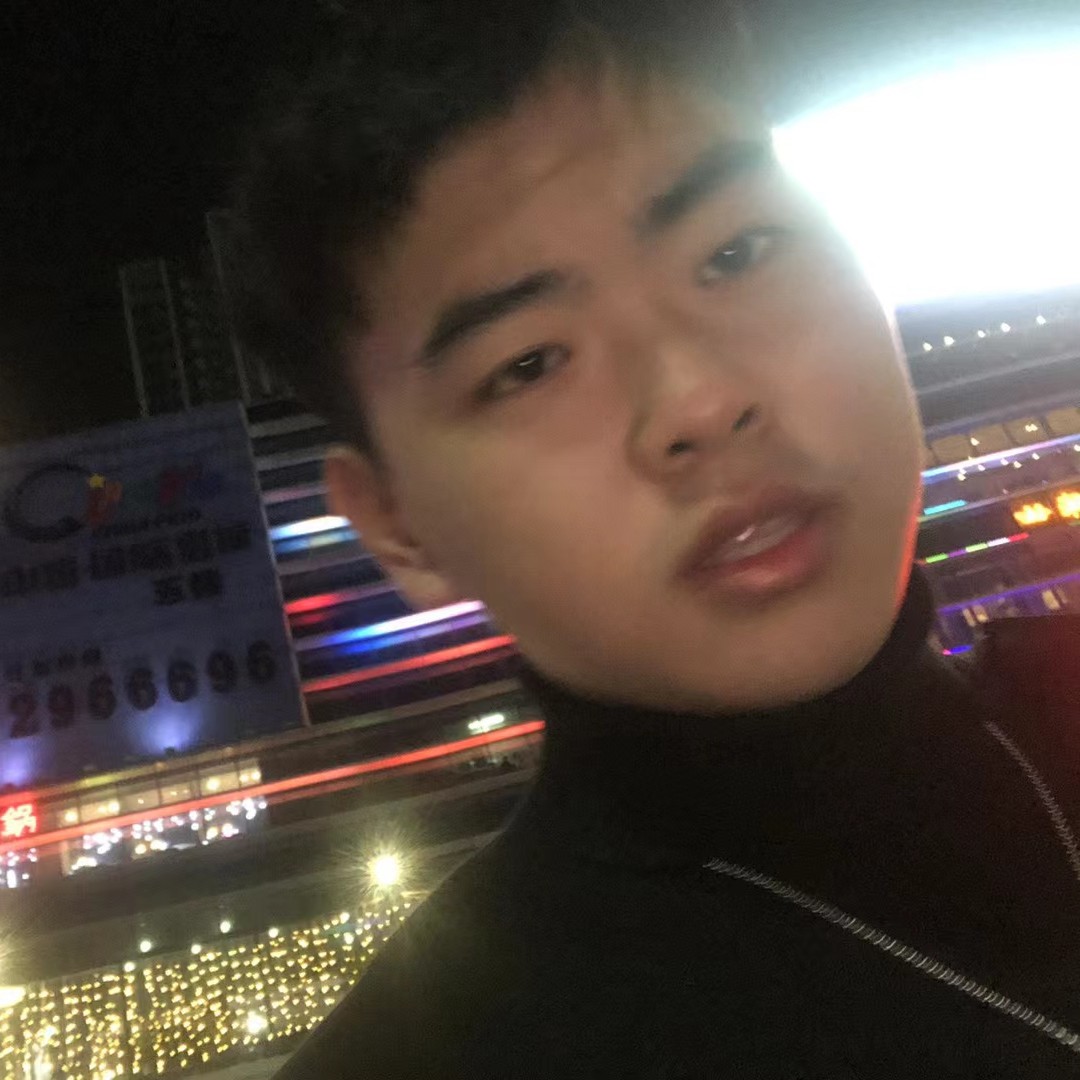 糊涂闻荷花的照片