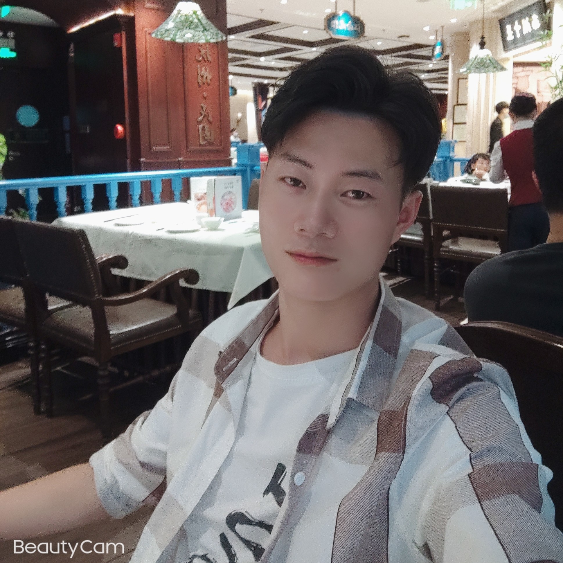 阳光一般的男人的照片