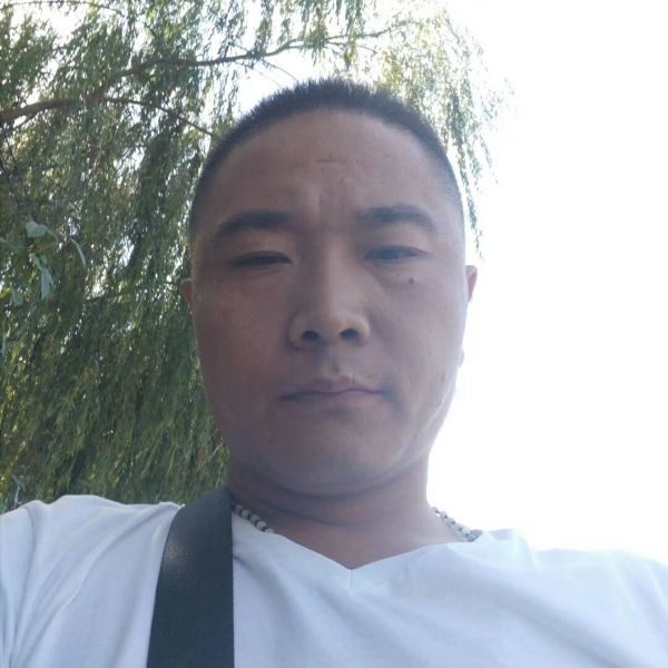 芝麻拿微笑的照片