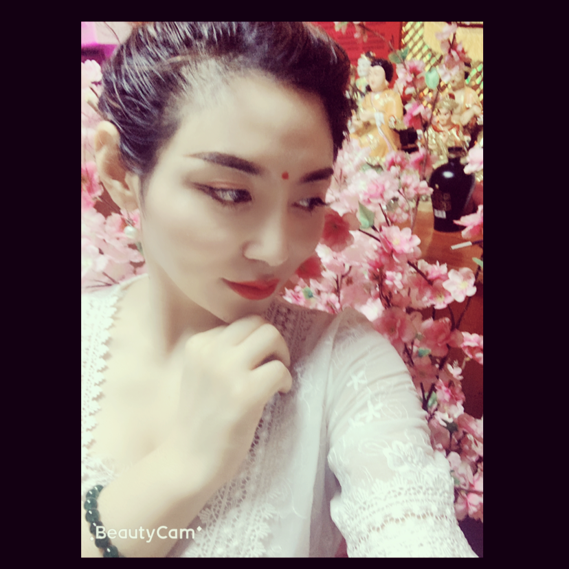 妙然的照片