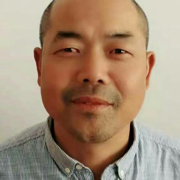 沉默老虎邱才根的照片