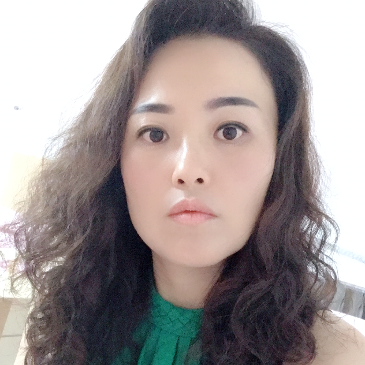 精明回首羽裳的照片