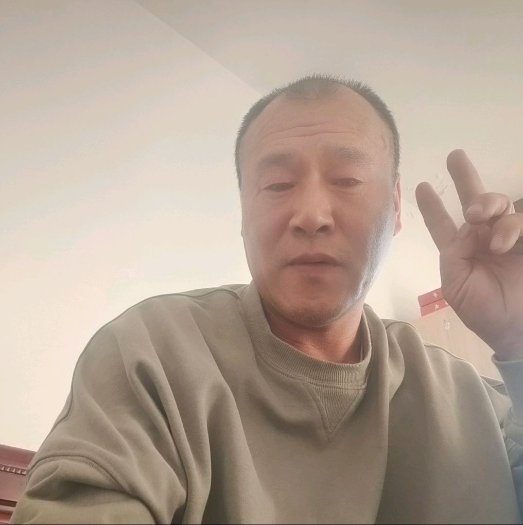 傻傻拿花生的照片