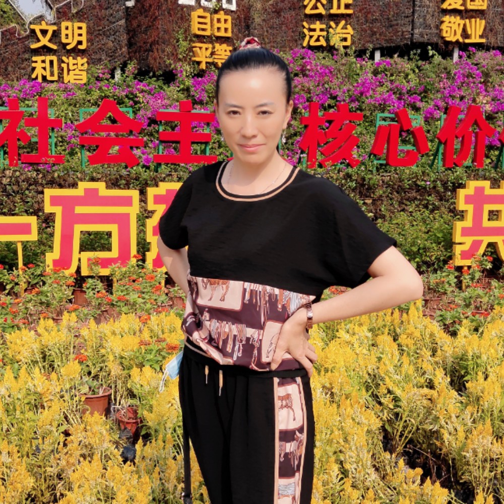 阔达漫步紫萱的照片