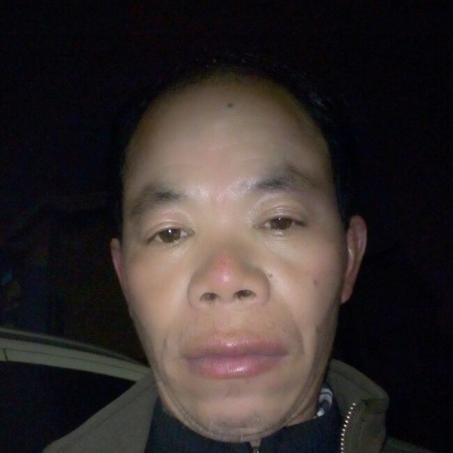 认真楼房胡长松的照片