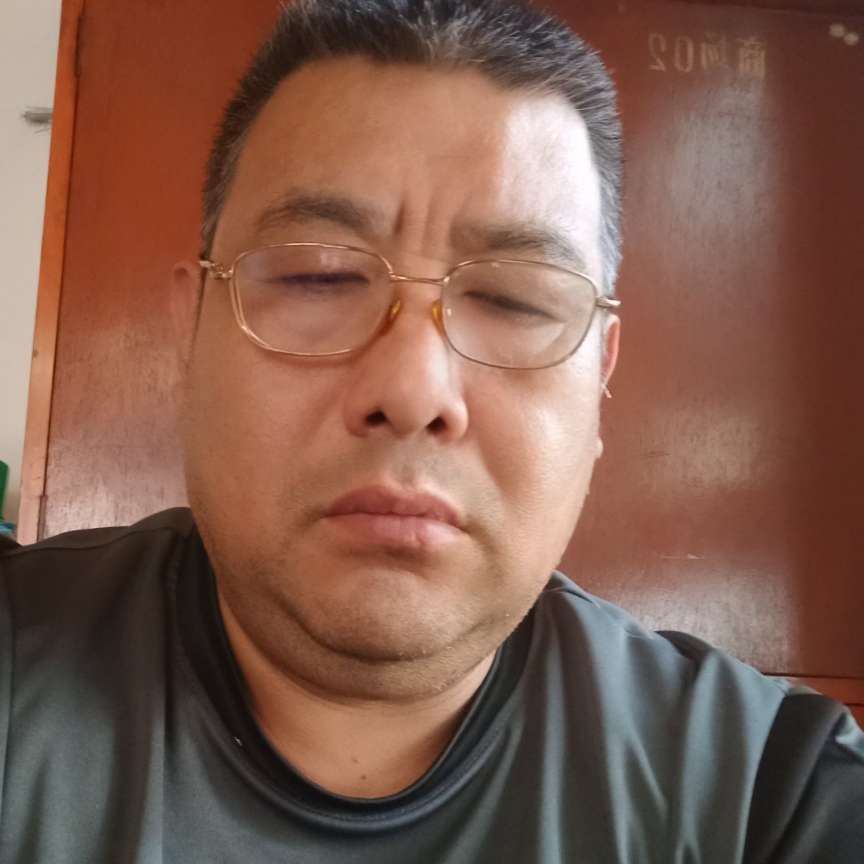 善良胖哥的照片