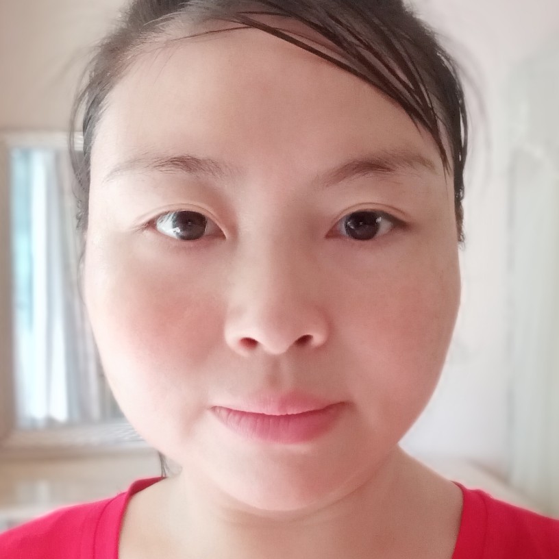 清爽拿微笑的照片