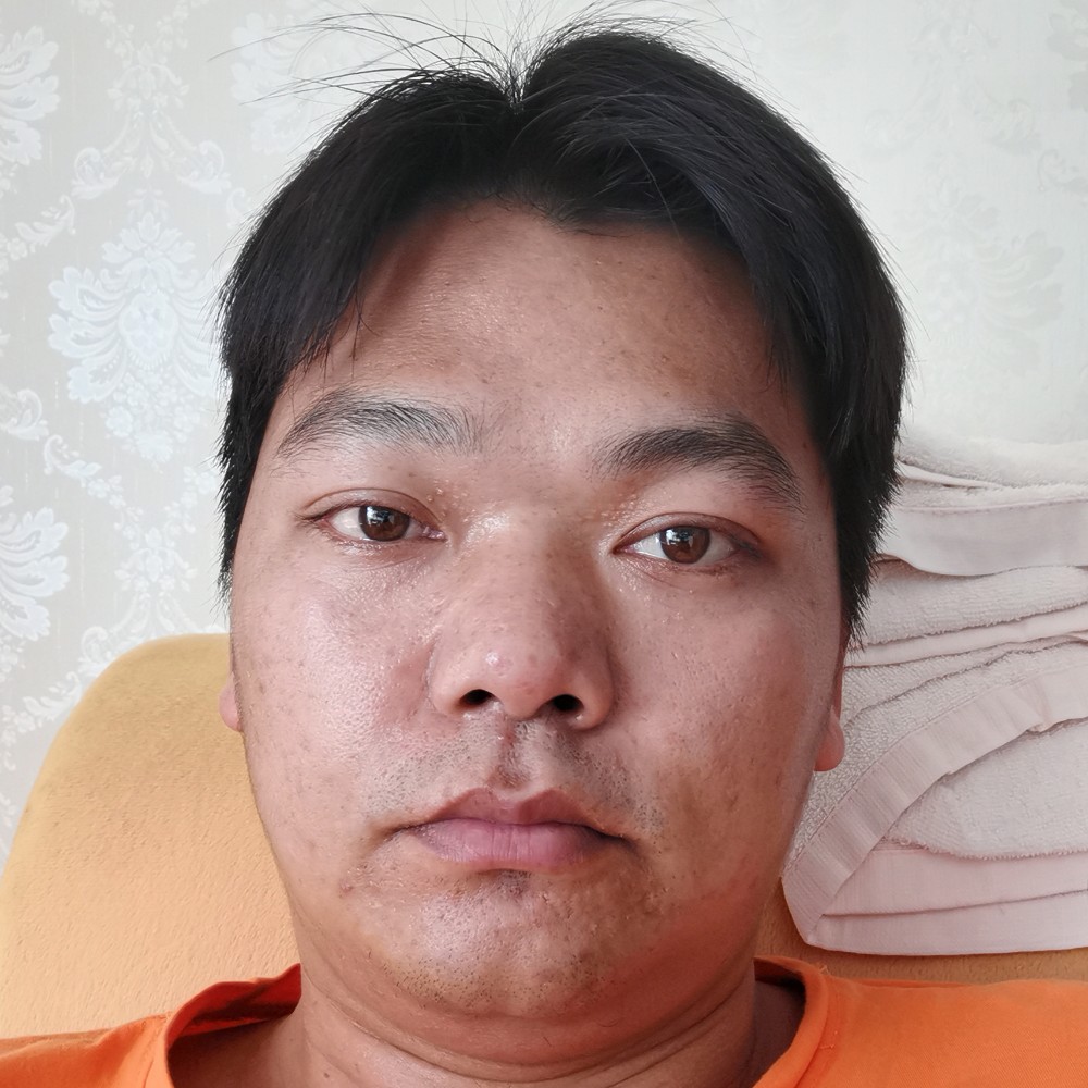 罗志坚的照片