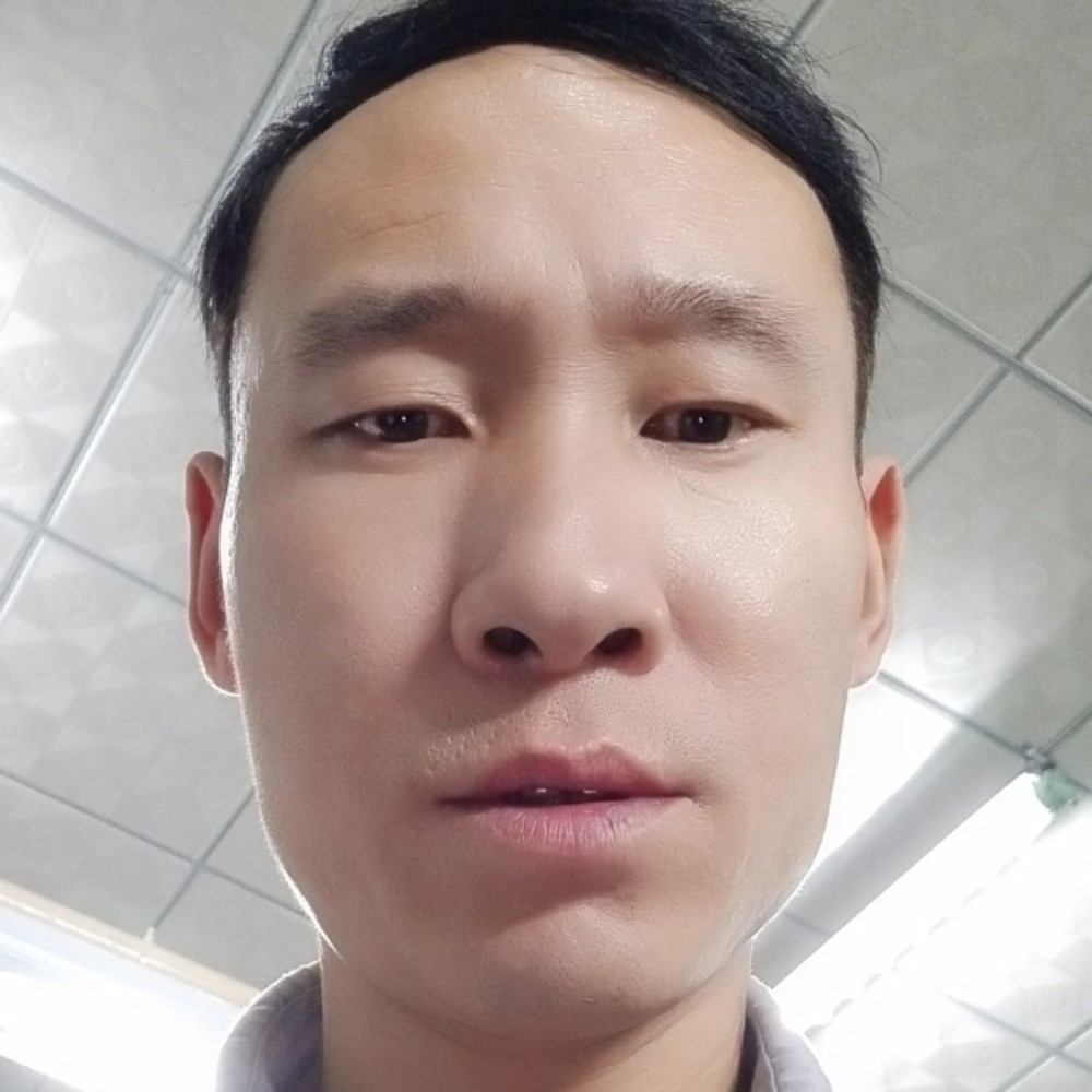害羞回眸蜜蜂的照片