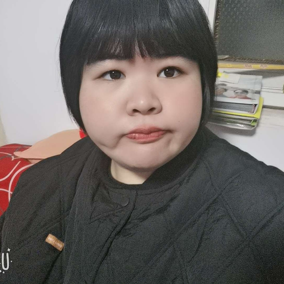 傻傻可爱的小胖妞的照片