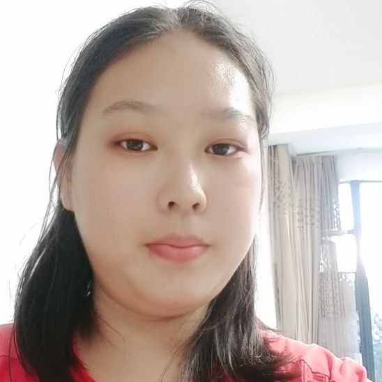 落寞拿小丸子的照片