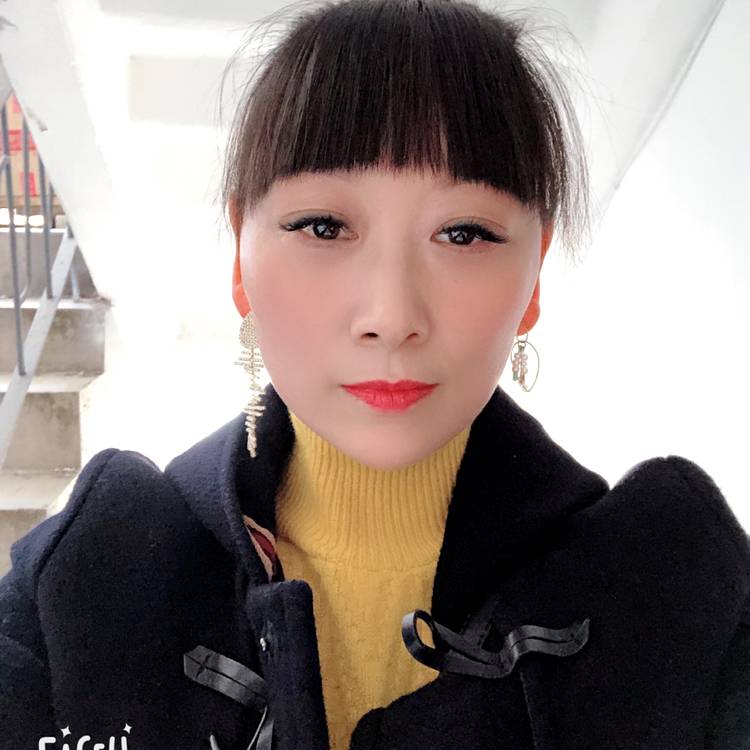 洋洋一笑的照片