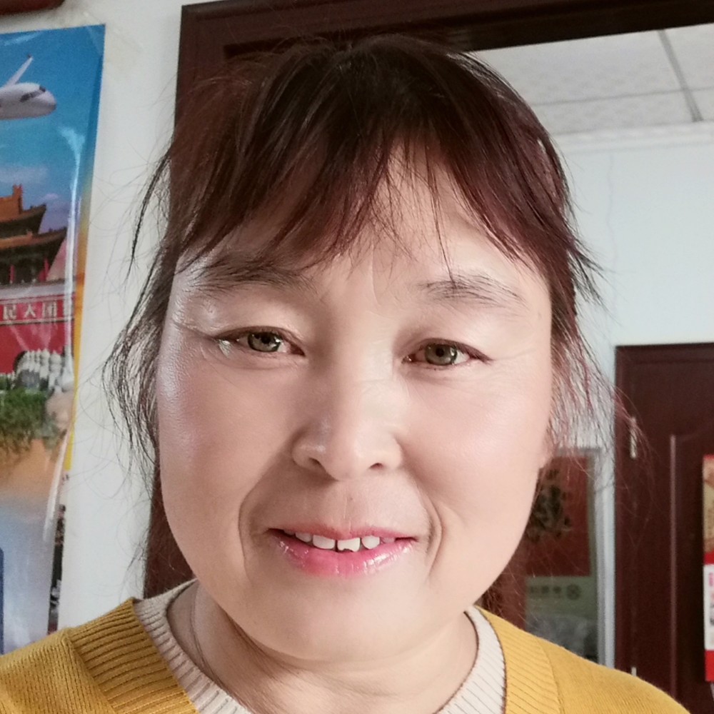 漂亮闻蓝天的照片