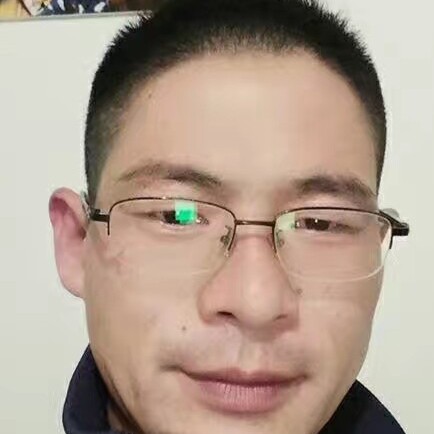 小巧拿小丸子的照片