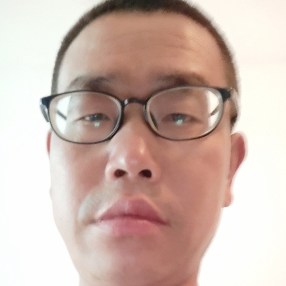 玫瑰闻成就的照片