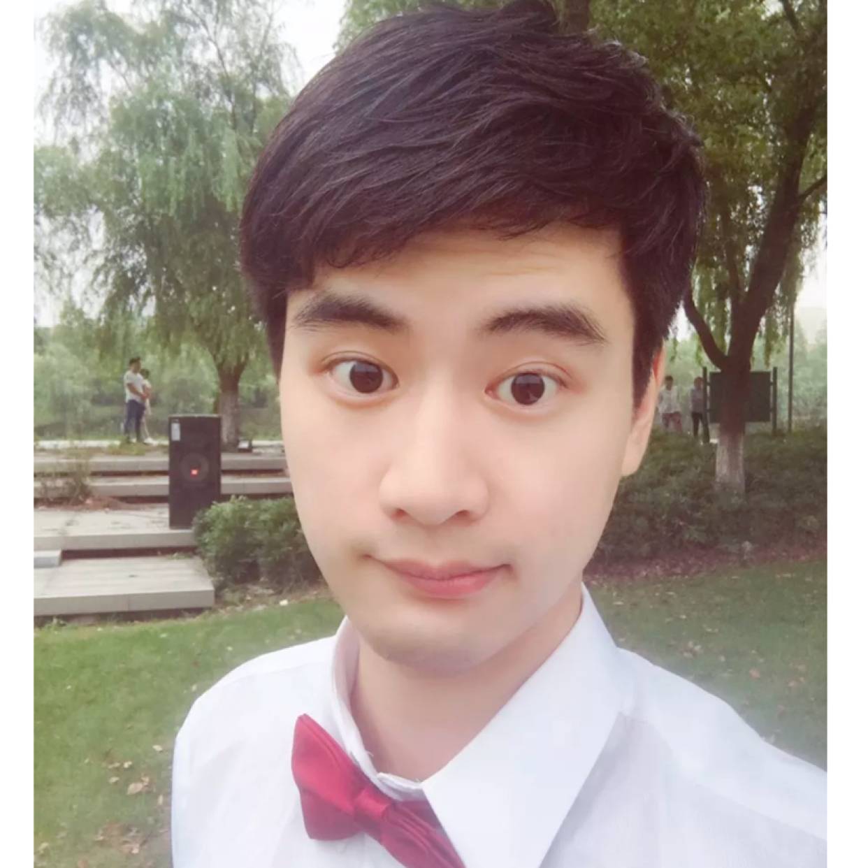 西装拿动听的照片