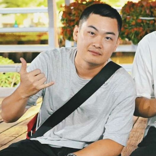 马梁明的照片