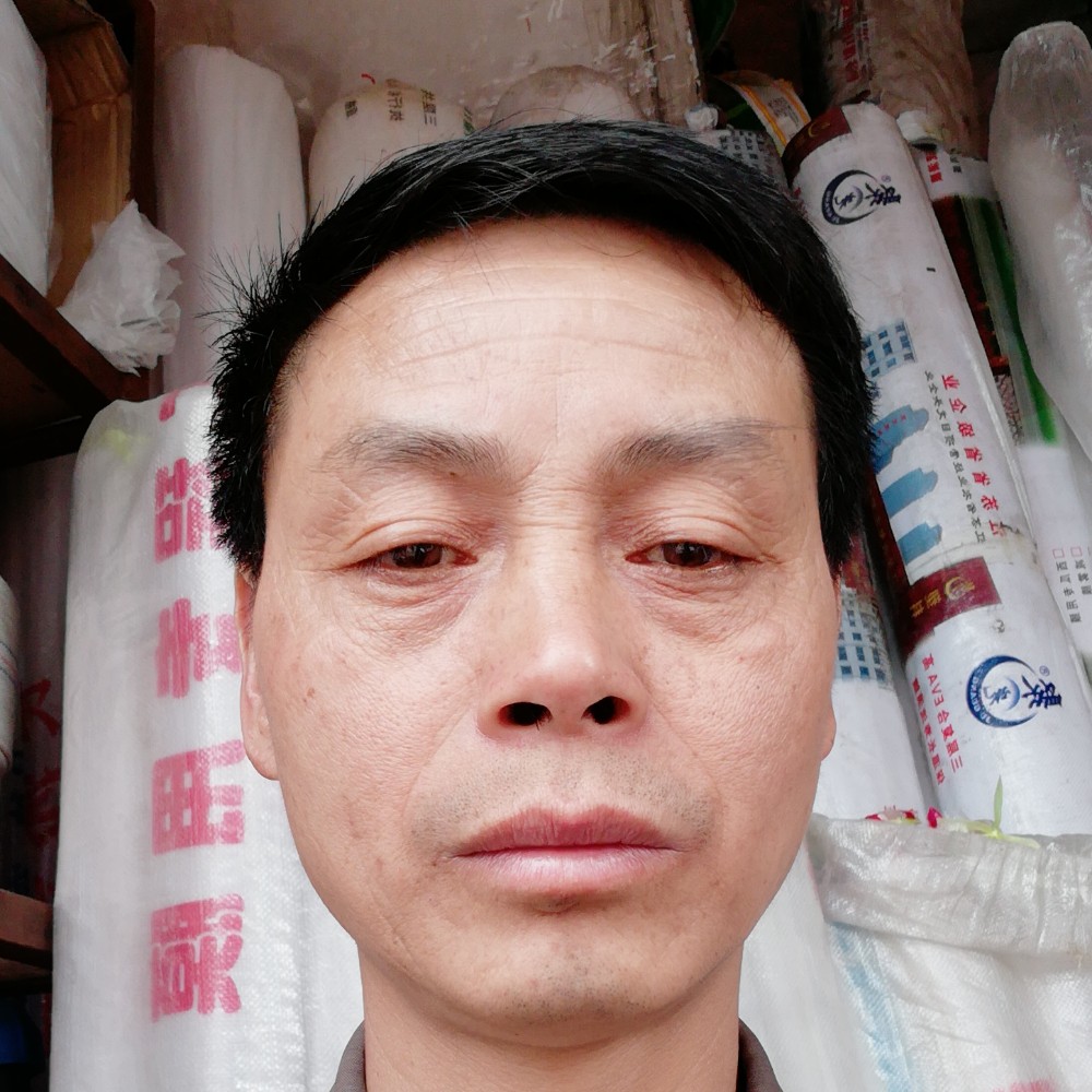 谭建春的照片