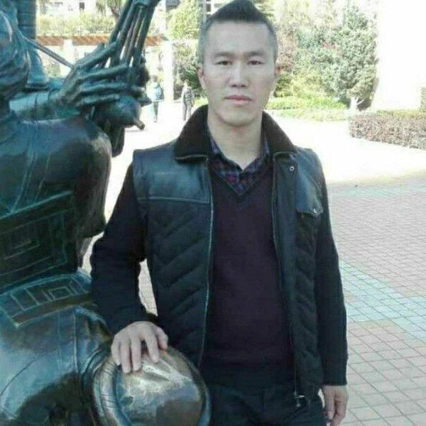 石明忠的照片