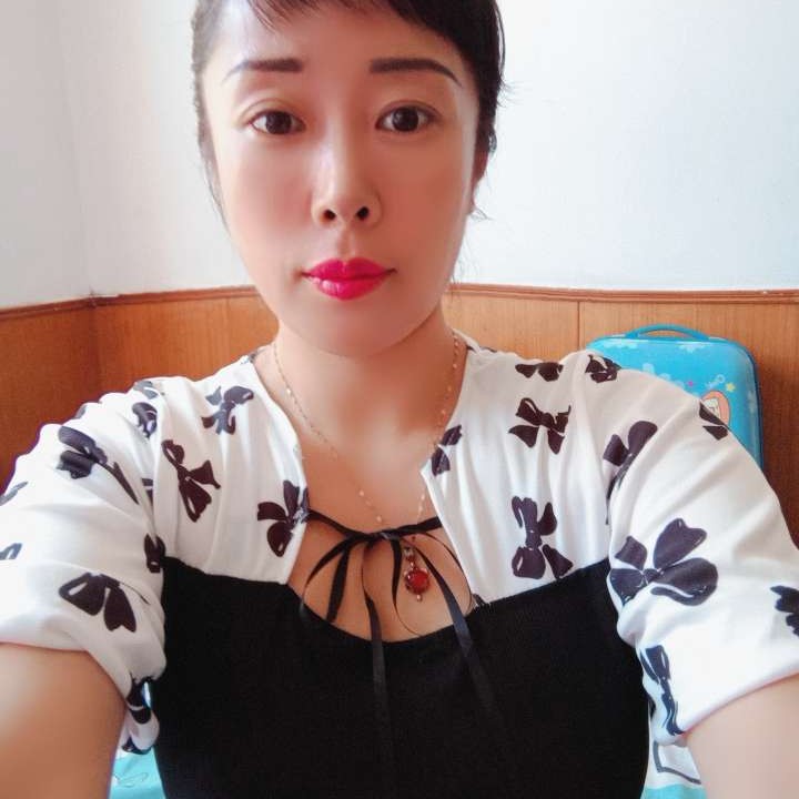 美女迎甜美的照片