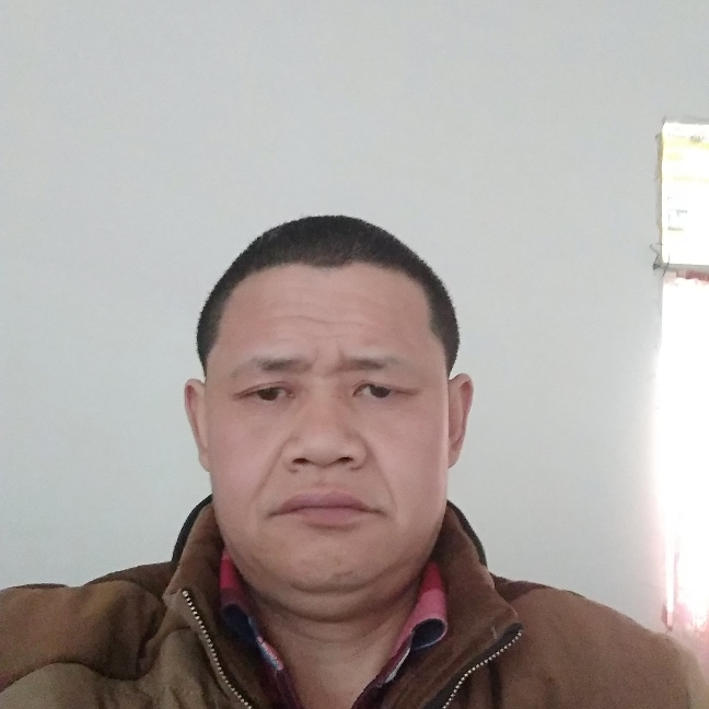李谋春的照片