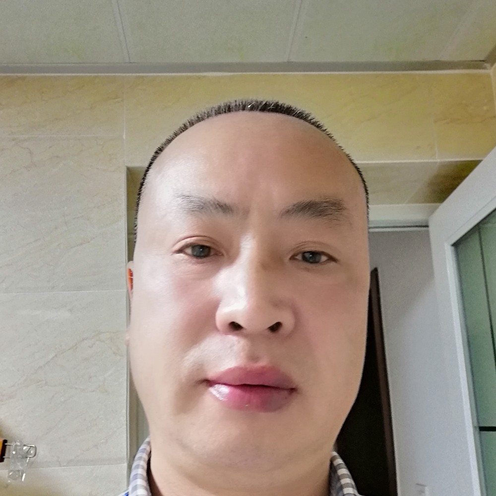 曾经挽手砖头的照片