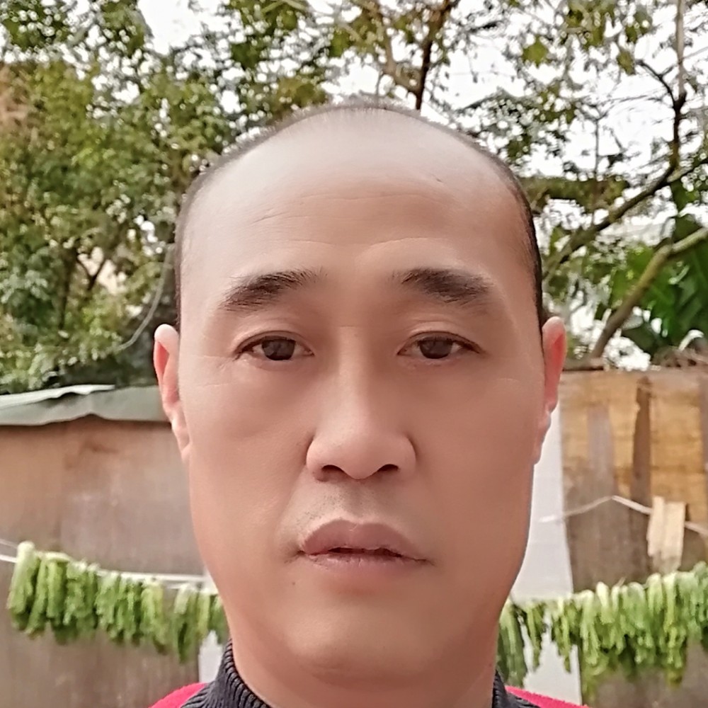 迷离拿芒果的照片
