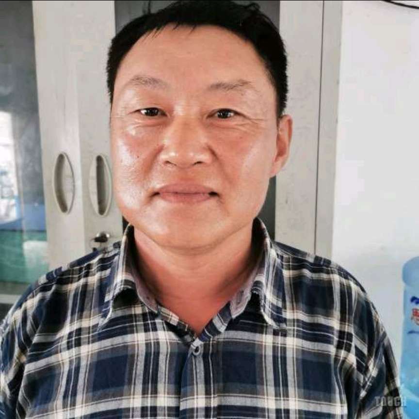 顾建国的照片